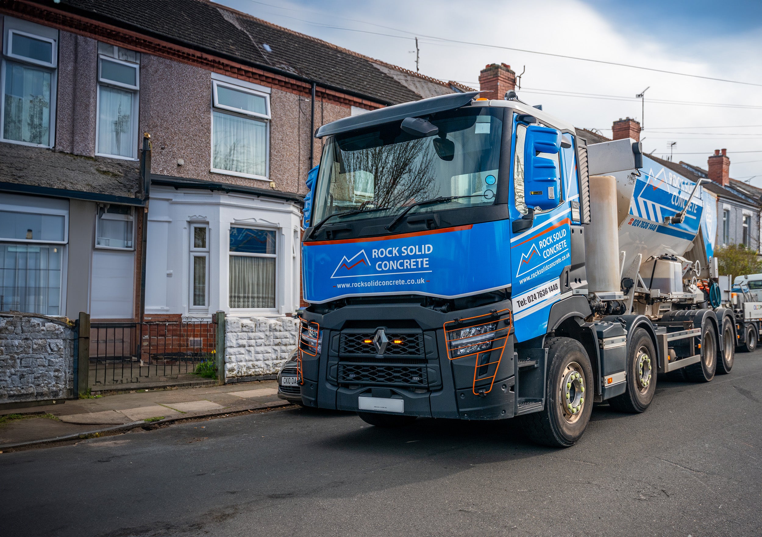 Ready-mix concrete delivery truck
